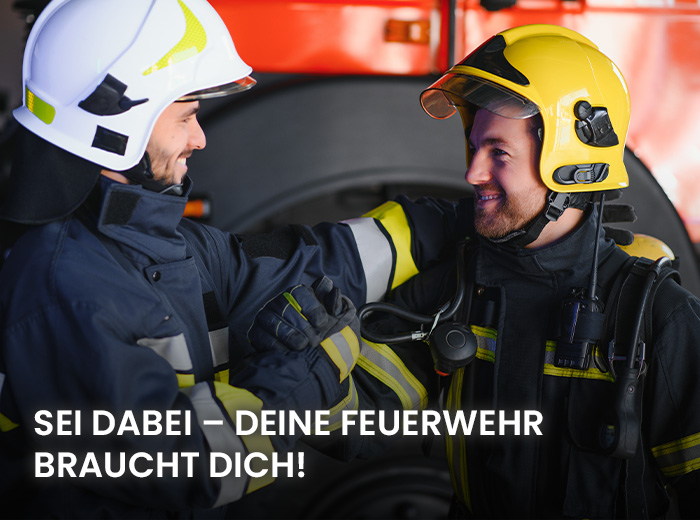 Teamst&auml;rke: 2 Feuerwehr M&auml;nner die sich die Hand geben